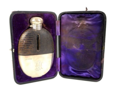 Victorian silver and leather covered oval hip flask, with monogrammed cup, and fitted leather case, Walker & Hall, Sheffield,