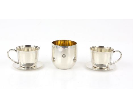 Pair of sterling silver coffee/tea cups with matching saucers and a boxed silver tumbler by MW, London 2000