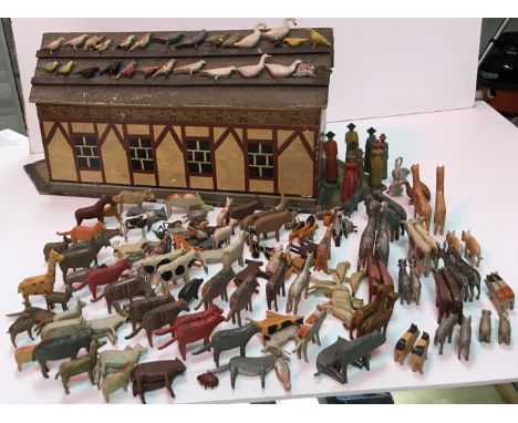 A late 19th Century German (or possibly Dutch) painted pine Noah's Ark with lithograph band of figures in clogs dancing, on a