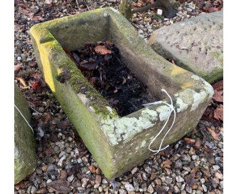A natural stone trough of rectangular form, approx 58 cm wide x 38 cm deep x 24 cm high