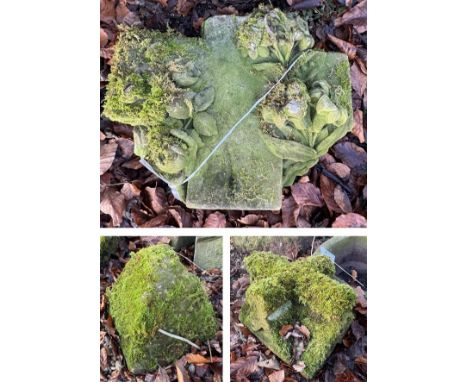 A carved natural stone section with floral decoration, appears to be the top of a cross, approx 44 cm wide x 16 cm deep x 37 