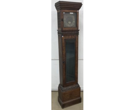 A 20th Century oak cased long case clock, the 19th Century movement with square brass dial and single hand, the chapter ring 