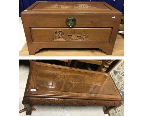 A modern Chinese carved teak trunk with figural decoration on bracket feet, 88 cm wide x 43 cm deep x 48 cm high together wit
