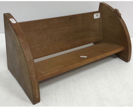 An oak book trough with carved mouse motif by Robert Thompson (The Mouseman) of Kilburn 45.3 cm wide x 20.8 cm high CONDITION