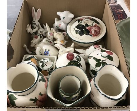 A collection of Wemyss style pottery including cabbage rose soap dish and cover and storage jar, a Llanelly Wild Rose pattern