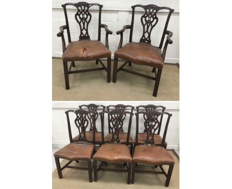 A set of eight 19th Century mahogany framed Provincial Chippendale design dining chairs (six plus two carvers), with tassel c