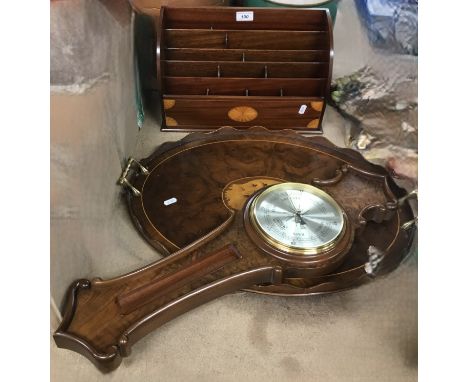 A 20th Century burr walnut and shell marquetry inlaid oval two handled drinks tray with brass handles in the Georgian style, 