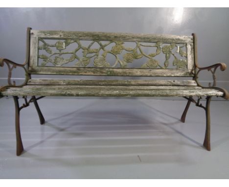 VINTAGE GARDEN BENCH with cast ends and wooden slats, 74cms H, 126cms W, 43cms D