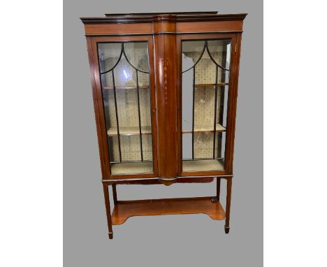 CHINA CABINET - Edwardian mahogany, two door on spade feet, with lower shelf and railback top, 180cms H