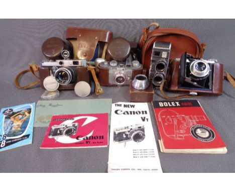 VINTAGE CAMERAS &amp; EQUIPMENT to include cased Canon 50, Balda, Polaroid cine-camera ETC
