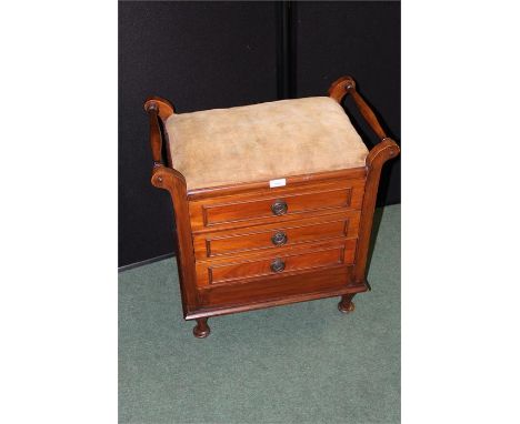 Edwardian piano stool, with upholstered seat flanked by turned rails above three drawers with fall-fronts, on cabriole legs a