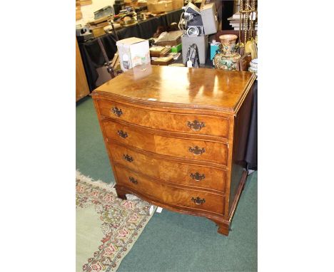 Reproduction walnut veneered serpentine front chest of four long drawers, on bracket feet, 78cm wide