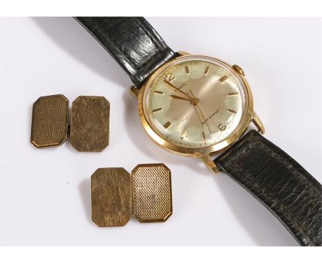Pair of gold on silver cufflinks and a Timex wristwatch