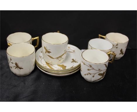 Moore Bros porcelain part coffee service, in white with gilt butterfly decoration, the underside marked Moore Bros 97931, to 