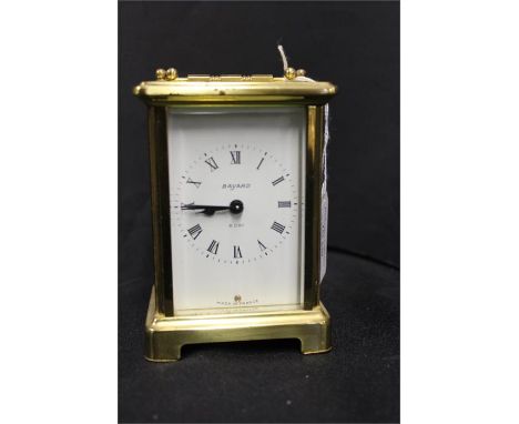 Gilt brass French carriage clock, with a signed white enamel dial