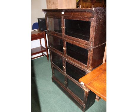 Globe Wernicke style bookcase, in four sections with eight glazed doors, on a plinth base, 88cm wide