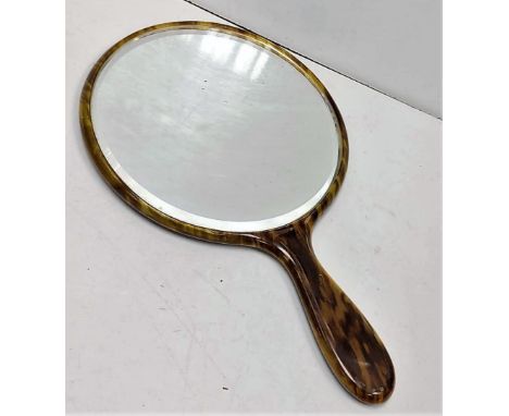 Faux tortoiseshell vintage oval hand mirror. 15cm diameter. 