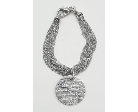 Sterling Silver multi strand bracelet with love charm in various languages, weight 18.9g and 18cm long approx, 2.5cm diameter