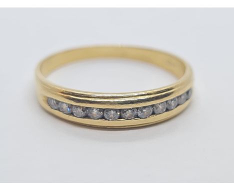 18ct gold diamond set half eternity ring, weight 1.8g approx with 0.20ct diamond and size K 