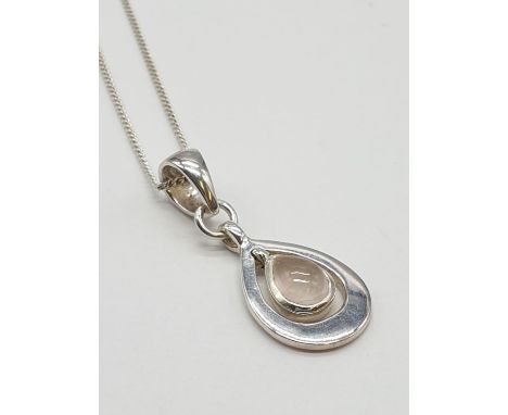 Sterling Silver Moonstone pendant on 40cm long silver Chain, weight 3.6g and pendant is 2.5cm drop approx 