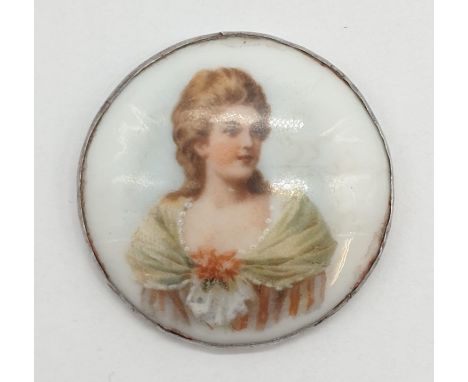 A vintage miniature porcelain portrait with London silver 1905 base. 