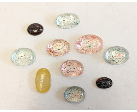 10 pieces of Islamic Agate stones and crystals inscribed with Arabic calligraphy.