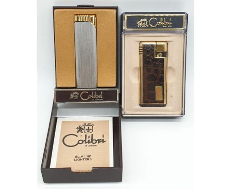 2x Vintage electric Colibri lighters: 1x crocodile and 1x steel slimline. Comes with original boxes and paperwork. 
