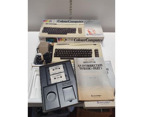 A Commodore Vic 20 colour computer with manual etc