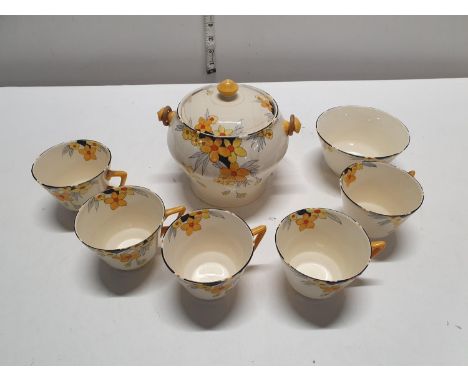 A pretty Art Deco period part tea service by Crown Ducal entitled sun burst, shipping available