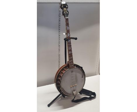 A Richwood RBJ-705 banjo with stand, shipping unavailable