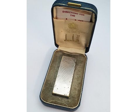 A boxed vintage Dunhill lighter (has wear to gilt)