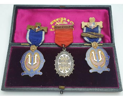 A box set of three Oddfellows enamel pendants (one hallmarked silver)