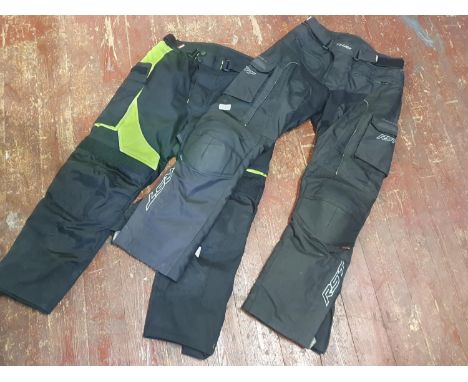 Two pairs of motorbike trousers size L