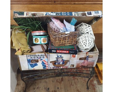A wooden trunk full of assorted collectibles on a wrought iron stand, shipping unavailable