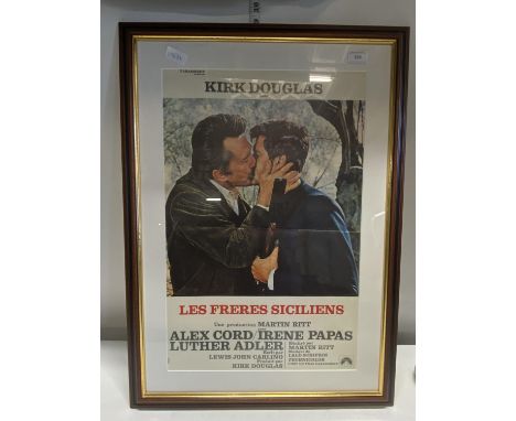 A framed film poster 'Les Freres Siciliens' 54x76cm, shipping unavailable