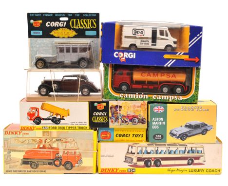 3 Dinky Toys. Vega Major Luxury Coach (954). In white with metallic plum coloured side, and light blue interior. Plus a Jones