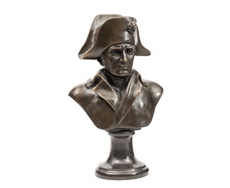 A bronze head and shoulders bust of Napoleon, wearing bicorne hat and cloak, incorporating signature “A. Canova” at the back,