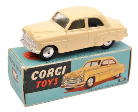 Corgi Toys Vauxhall Velox (203). Example in cream with flat faced wheels, motor in working order. In early all blue box, mino