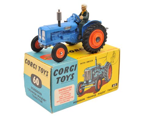 Corgi Toys. Fordson “Power Major” Tractor (60). In mid blue with orange plastic wheels and black rubber tyres. Complete with 