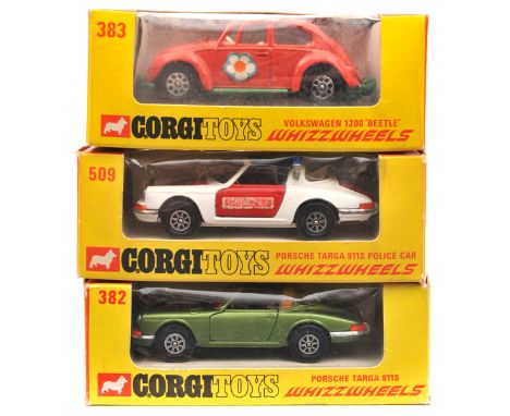 3 Corgi Whizzwheels. Porsche Targa 911S (382) in light metallic green with red seats. A Porsche Targa 911S Police Car (509). 