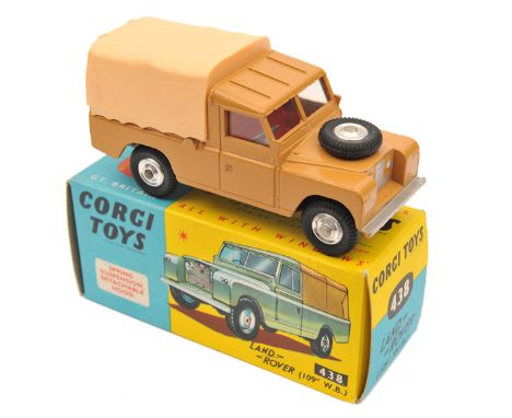 Corgi Toys Land Rover (109" WB) (438). Example in light brown with red interior and cream rear plastic canopy. Boxed. Vehicle