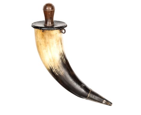 An early 19th century gunner’s powder horn, line engraved brass nozzle with spring catch, darkwood base with screw-in filler 