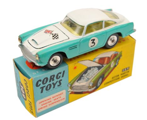 Corgi Toys Aston Martin Competition Model (309). In white and turquoise with yellow interior, crossed flags to bonnet, RN3. B