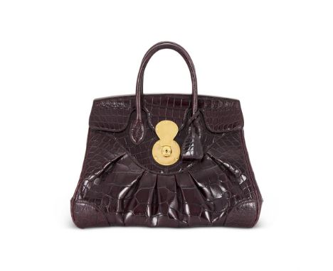 Y RALPH LAURENAN AUBERGINE CROCODILE HANDBAG With twin leather loop handles, a key lock clasp, the flap opening to a leather 