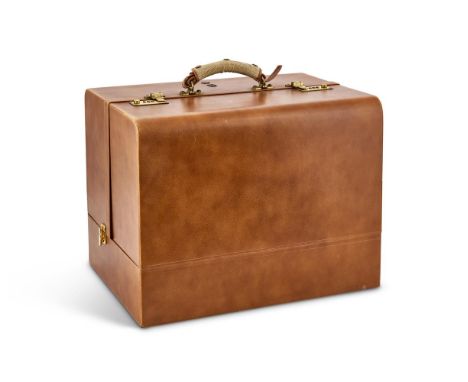 ASPREY A TAN LEATHER JEWELLERY CASEWith a loop handle, twin combination flip lock clasps, with traces of removed coroneted mo