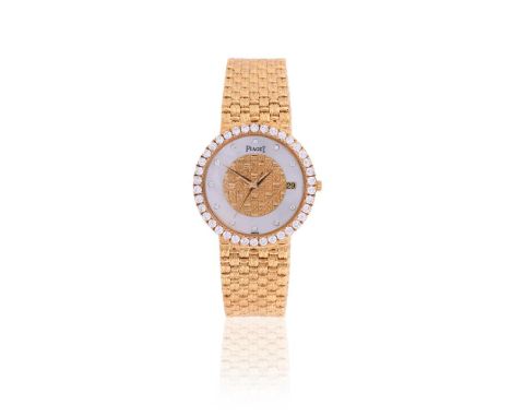 Y PIAGET, REF. 34256 D23A GOLD COLOURED AND DIAMOND PERPETUAL CALENDAR BRACELET WATCH, NO. 457773Movement: Cal. 34P1, quartz,