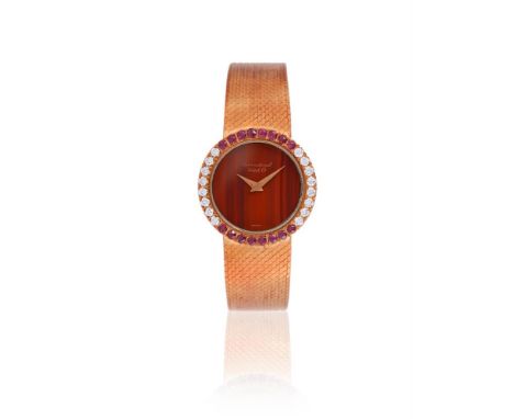 INTERNATIONAL WATCH CO. (IWC) A LADY'S GOLD COLOURED RUBY AND DIAMOND BRACELET WATCH, NO. 2167217 R 0801Movement: Cal. 1852, 
