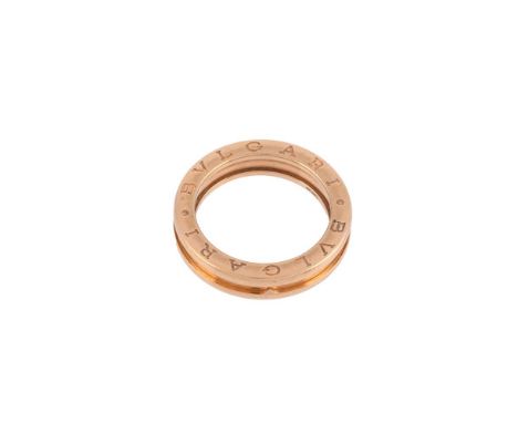 BULGARI, B-ZERO 1 GOLD COLOURED RING CIRCA 2014The polished band with shaped raised borders, the bezels inscribed BVLGARI, st