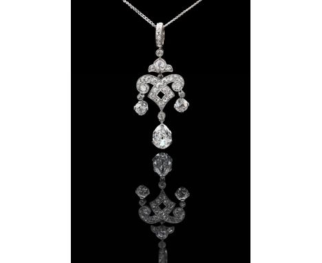 AN EARLY 20TH CENTURY DIAMOND PENDANT CIRCA 1920The pierced shaped knot like millegrained pendant set throughout with old cut