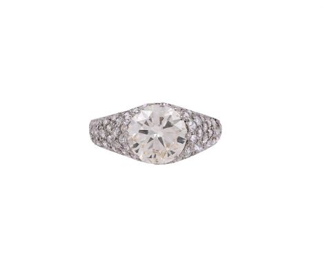 A DIAMOND SINGLE STONE RINGThe principal brilliant cut diamond weighing 2.42 carats, claw set above pavé set eight cut diamon